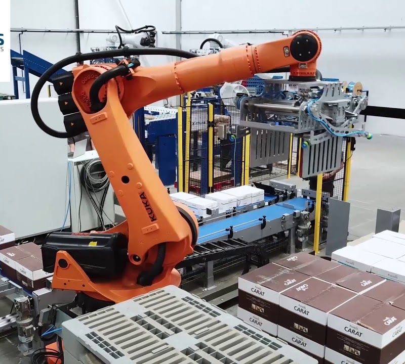 Robot paletizador de cajas con track movil